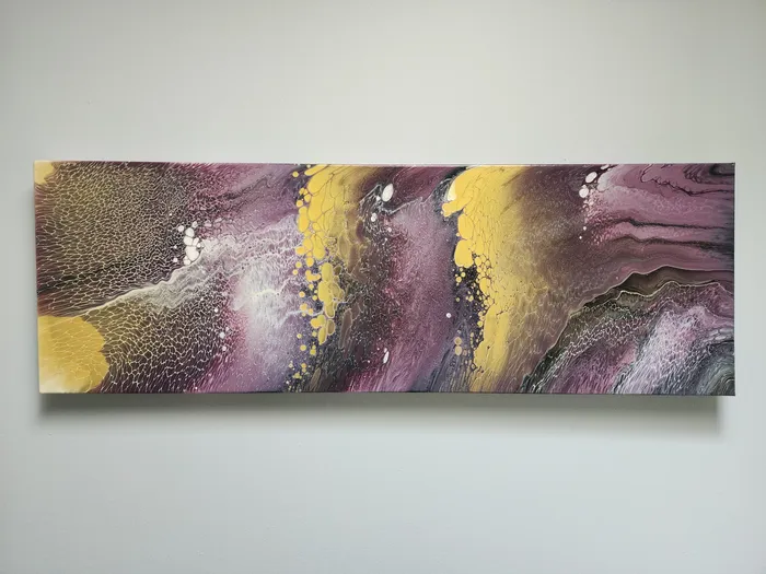 A wide, fluid art, canvas painting on a neutral wall. The piece shows off alternating golden and violet ribbons with areas of white and grays visible.