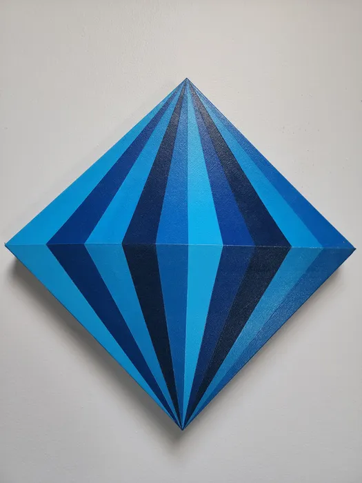A stylized, diamond art piece with alternating clean blue segments mimicking a gemstone.