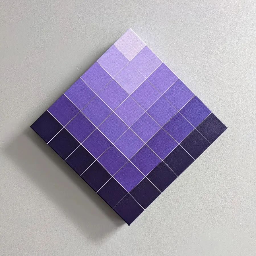Square canvas hung as a diamond, filled with a grid of purple squares graduating from deep violet at the edges to pale lilac at the top.